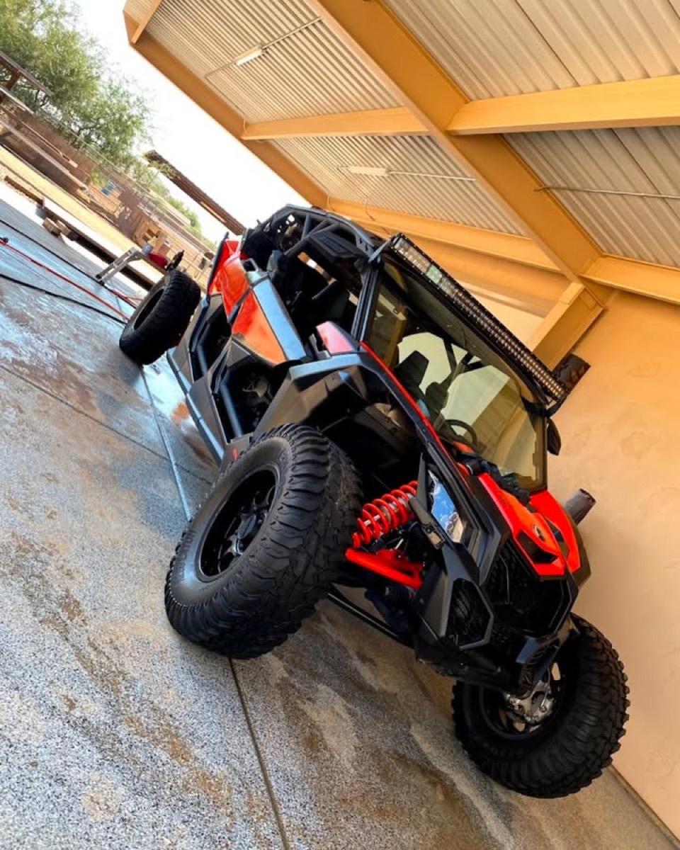 Off-road side-by-side UTV washed down after a trail day